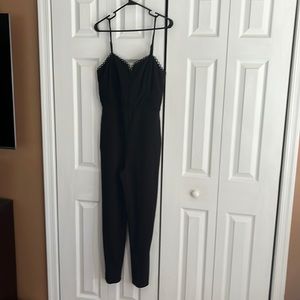 NWT Black jumpsuit with pockets.